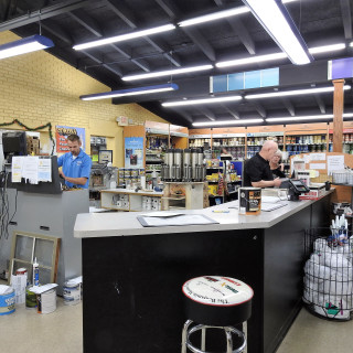 Man store counter surfboard standing - a surfboard free wallpaper for tablet