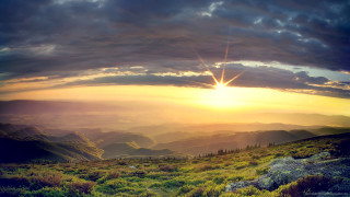 Sunset mountain range cloudy sky - crepuscular free wallpaper for desktop