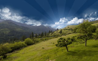 Green field trees mountains blue - cloud and sun rays free wallpaper for desktop
