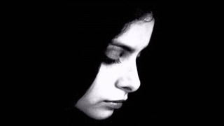 Woman eyes closed dark night - chiaroscuro free wallpaper