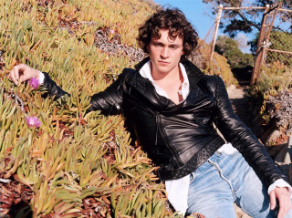 Man black jacket jeans hill - his hand and a cigarette free wallpaper