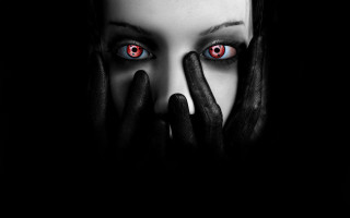 Woman red eyes black hands - free dark wallpaper for desktop