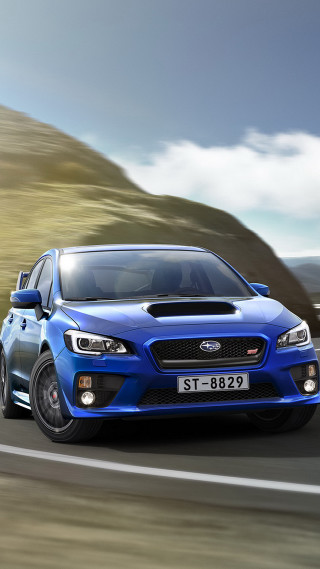 Blue subaru driving mountain road - free 3d render wallpaper for mobile