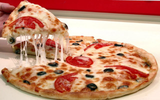 Person taking slice pizza white - a white table free wallpaper for desktop