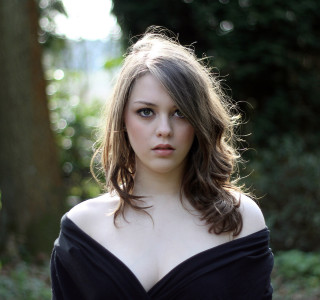 Woman black dress woods sunlight - free forest wallpaper for tablet