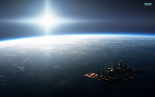 Space station earth sun shining 2 - a space station in the middle of the earth free wallpaper