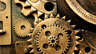 Close up clock gears dial - a close up of a clock free wallpaper