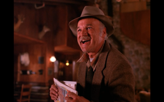 Man hat holding book smiling - twin peak free wallpaper for desktop