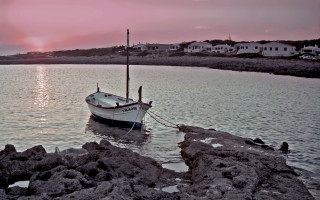 Boat docked lake sunset dawn - a pink sky in the background free wallpaper for desktop