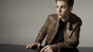 Man sitting table brown jacket - a brown jacket free wallpaper for desktop