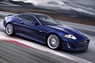 Blue sports car driving cloudy 2 - motion blur free wallpaper