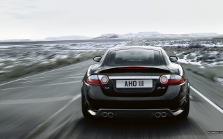 Black car mountain snow road - xf iq4 free wallpaper