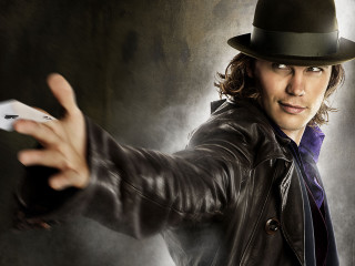 Man hat leather jacket holding - his other hand free wallpaper for desktop