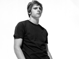 Man black shirt hands in - his hands in his pockets free wallpaper for desktop