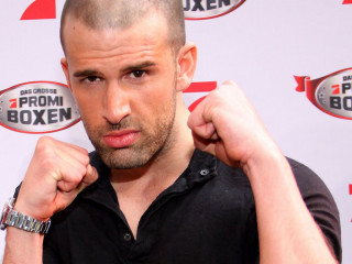 Bald man black shirt fists - a bald head free wallpaper for desktop