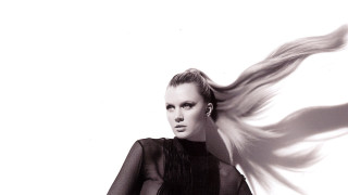 Woman blowing hair black dress 3 - vorticism free wallpaper