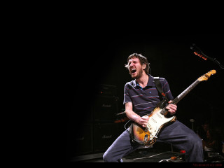 Man guitar stage microphone stuckism - a man playing free wallpaper