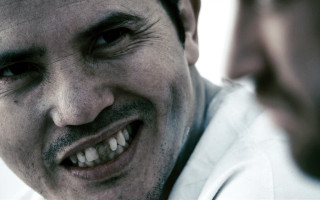 Smiling man with tie looking - the camera man free wallpaper for desktop