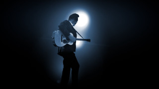 Man guitar dark light ball - free light wallpaper