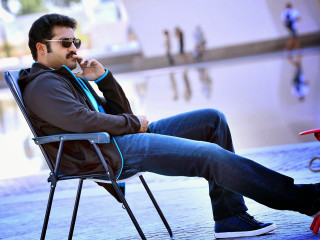 Man chair smoking cigarette public - public free wallpaper