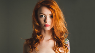 Woman red hair tattoo shoulder 2 - a grey background free wallpaper