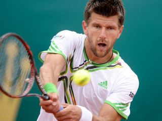 Man hitting tennis ball court - a tennis ball free wallpaper