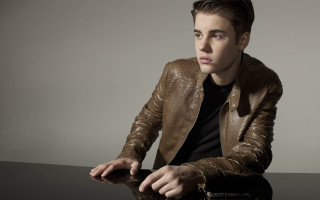 Man sitting table brown jacket 2 - a man sitting free wallpaper