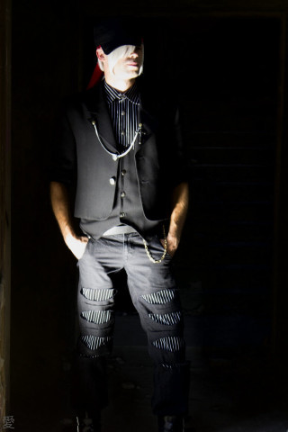 Man black shirt jeans doorway - contemporary fashion free wallpaper for mobile