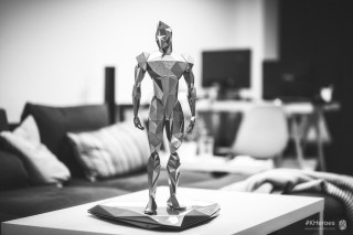 Paper sculpture man living room - figurativism free wallpaper