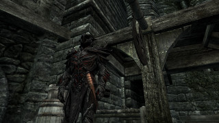 Man black outfit stone building - a stone building free wallpaper