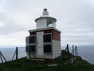 Small white red building hill - front view free wallpaper for desktop