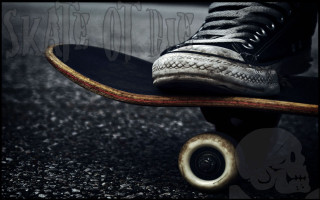 Skateboarder skull sneakers street action - a pair of sneakers free wallpaper