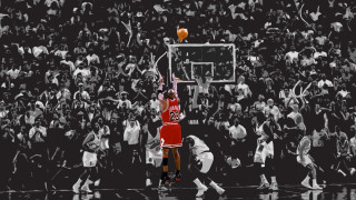 Man red jersey dunking basketball - a crowd free wallpaper