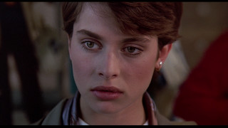 Woman scarf serious look camera - frances jetter free wallpaper