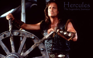 Man costume sword wheel holding - a man in a costume holding free wallpaper