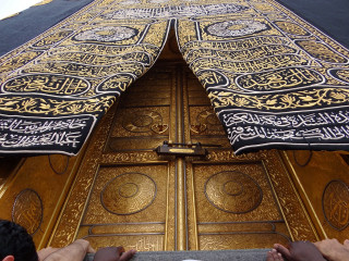 Person standing golden door cross - the door free wallpaper