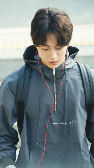 Young man backpack headphones phone - free aesthetic wallpaper for mobile