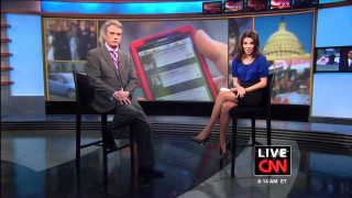 Man woman sitting chairs tv - a tv screen free wallpaper