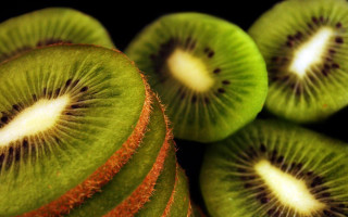 Kiwi fruit sliced closeup stacked - dom qwek free wallpaper for desktop