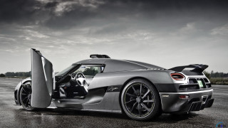 Silver sports car open doors 9 - a wet road free wallpaper