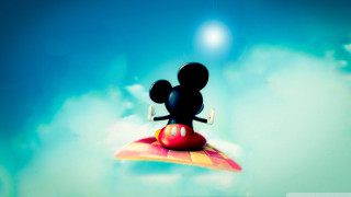 Mickey flying colorful object sky - blue background free wallpaper