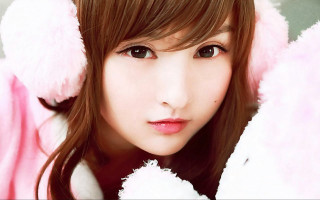 Woman pink coat furry hat - ear free wallpaper