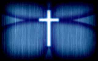 Cross blue background blurry effect - a cross free wallpaper