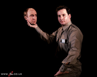 Two men in uniform posing - a large object free wallpaper for desktop