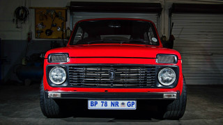 Red truck garage door open - a red truck free wallpaper