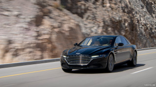 Black car driving road mountain - hillside free wallpaper