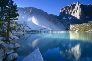 Mountain lake snowy mountains forests - a mountain lake free wallpaper