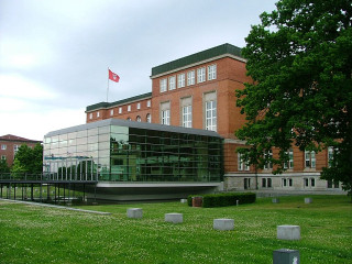 Building flag grassy trees fence - top of it next free wallpaper