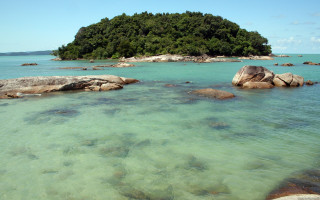Small island water rocks trees - a small island in the middle of a body free wallpaper