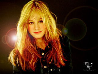 Woman longhair blackshirt brightlight videoart - free neon wallpaper for desktop